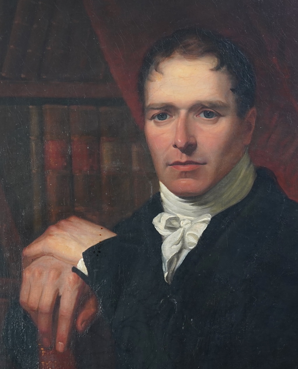 English School, 19th century, A portrait of a scholarly gentleman holding a book